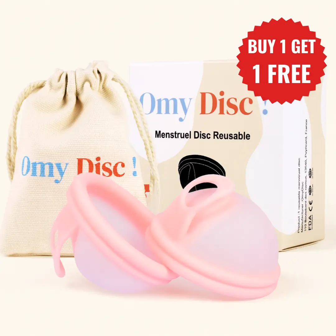 Menstrual disc with removal tab